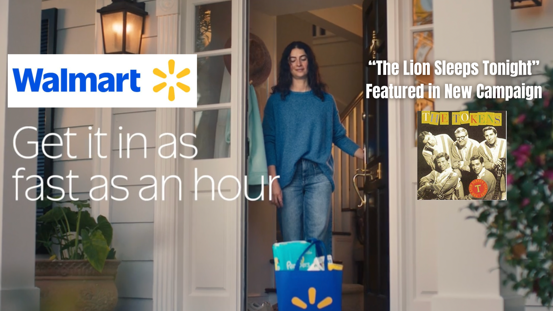 A woman carrying a Walmart shopping bag into her home.