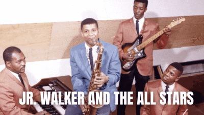 Two musicians playing saxophone and a bass guitar.