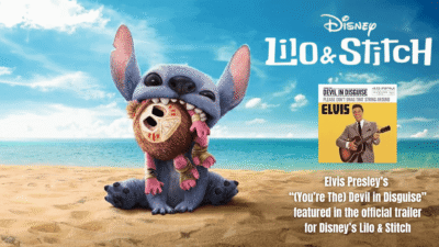Stitch holding Scrump doll on an beach from Lilo & Stitch.